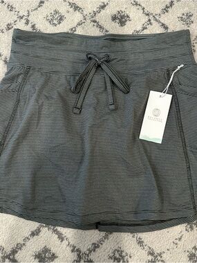 NEW Balance Collection Striped Active Skort in Charcoal and Black. Size Medium